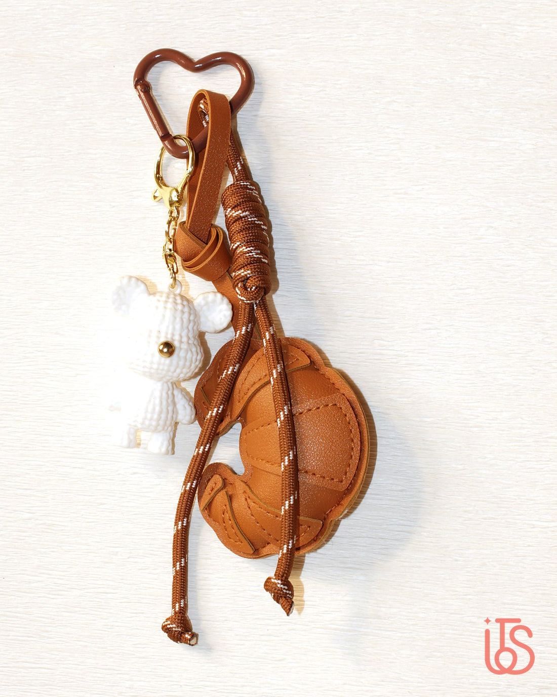 Croissant bag charm with knotted cord