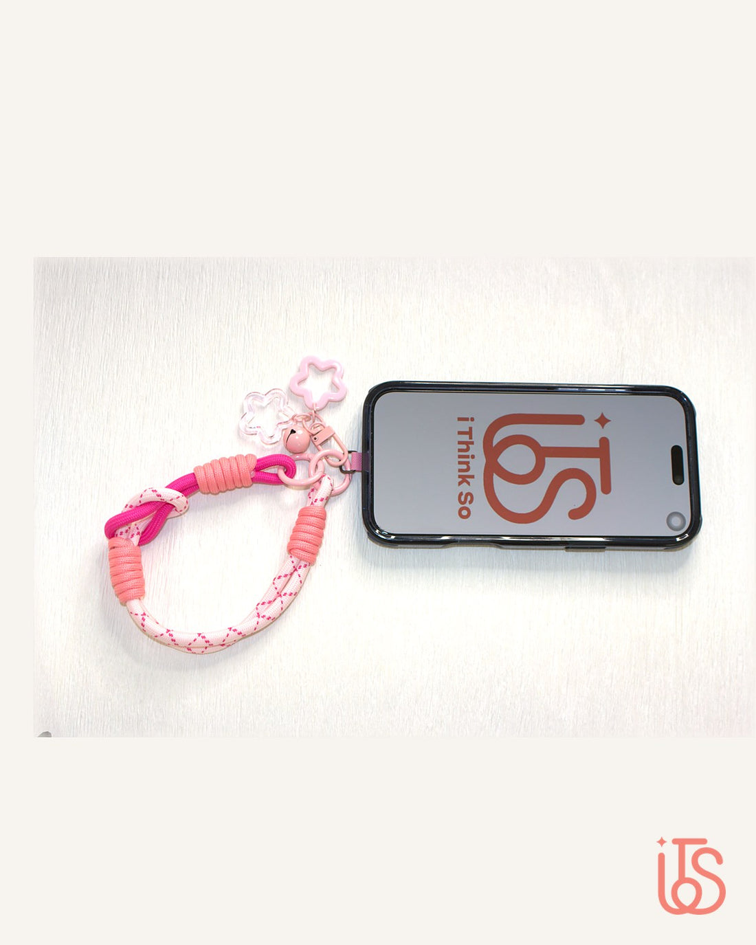 Rope phone strap clipped to a phone