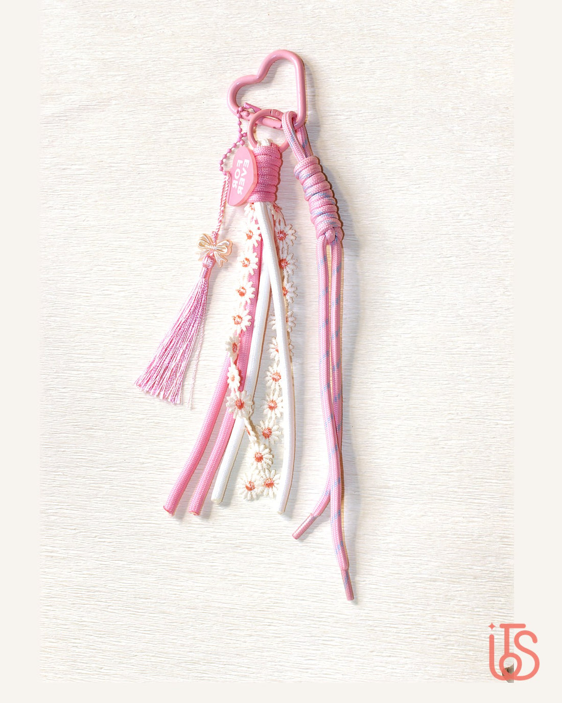 Pink daisy ribbon tassel bag charm