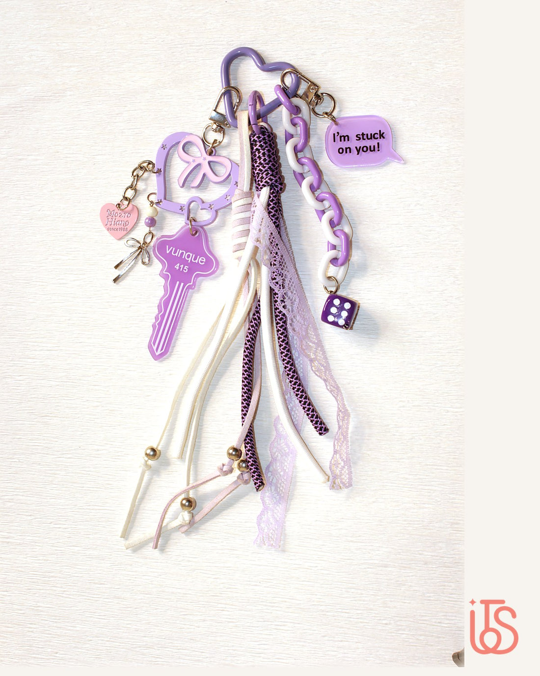 Lilac key cluster bag charm with ribbons and chain